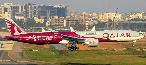 Qatar Airways airplane with FIFA World Cup 2022 branding.